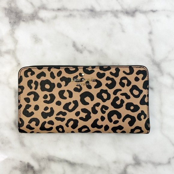 kate spade Handbags - Kate Spade Darcy Leopard Large Slim Bifold Wallet